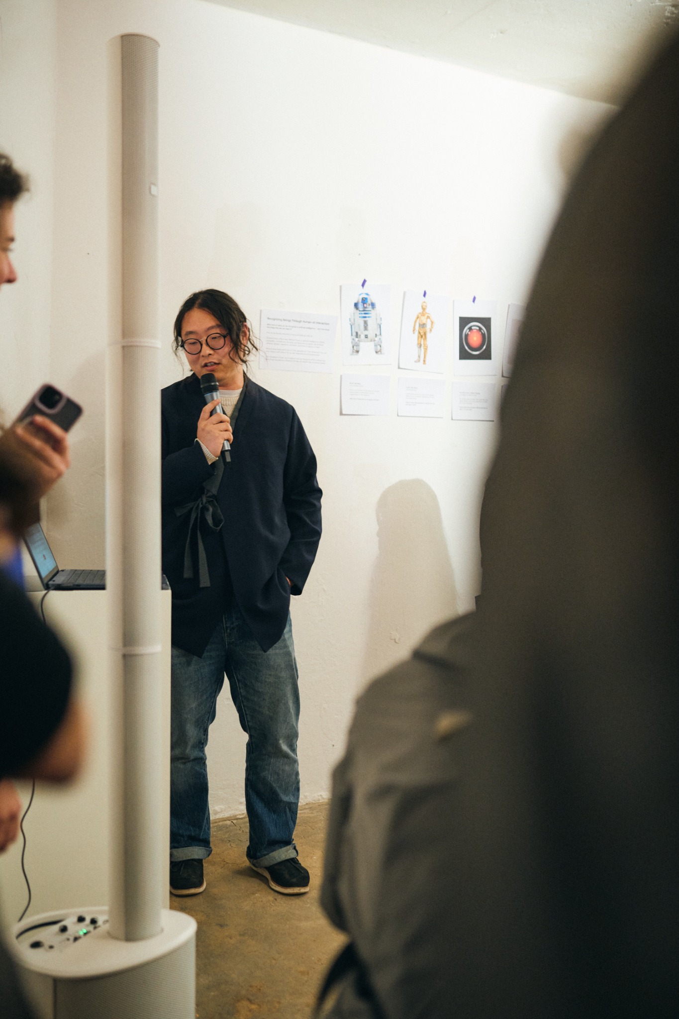 Taenyun Kim speaking at a research presentation